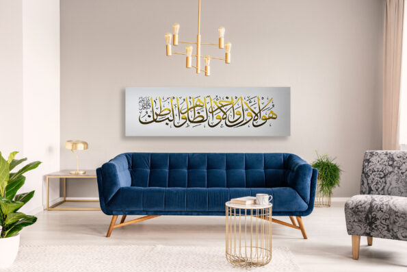 Gold lamp hanging above royal blue sofa in real photo of light g